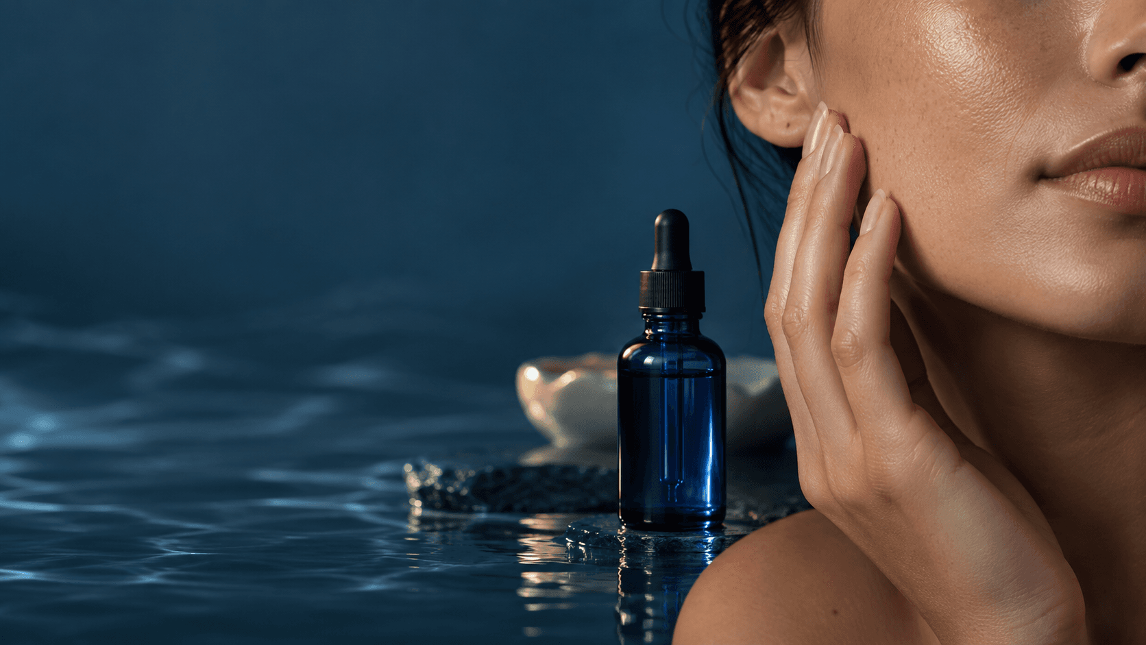 Natural skin, a gentle facial-care gesture, and an unbranded serum bottle